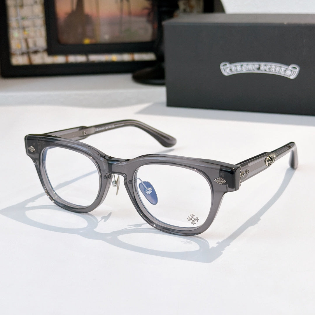 Glasses with dark gray frames and clear lenses, blue lens detail