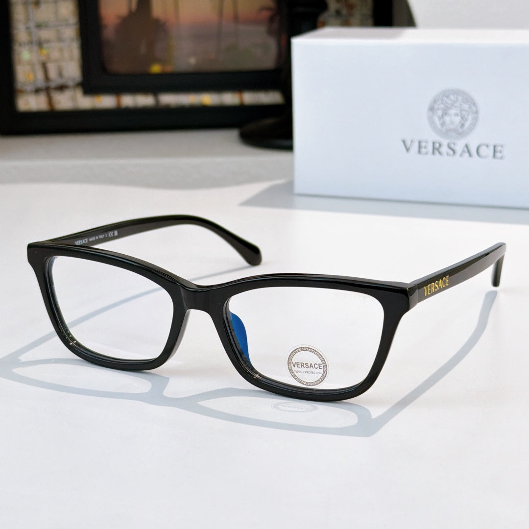 Versace eyeglasses with black acetate frames, clear lenses, blue temple detail, logo.