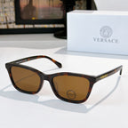 Versace sunglasses with tortoise acetate frames and brown lenses, logo on temple.