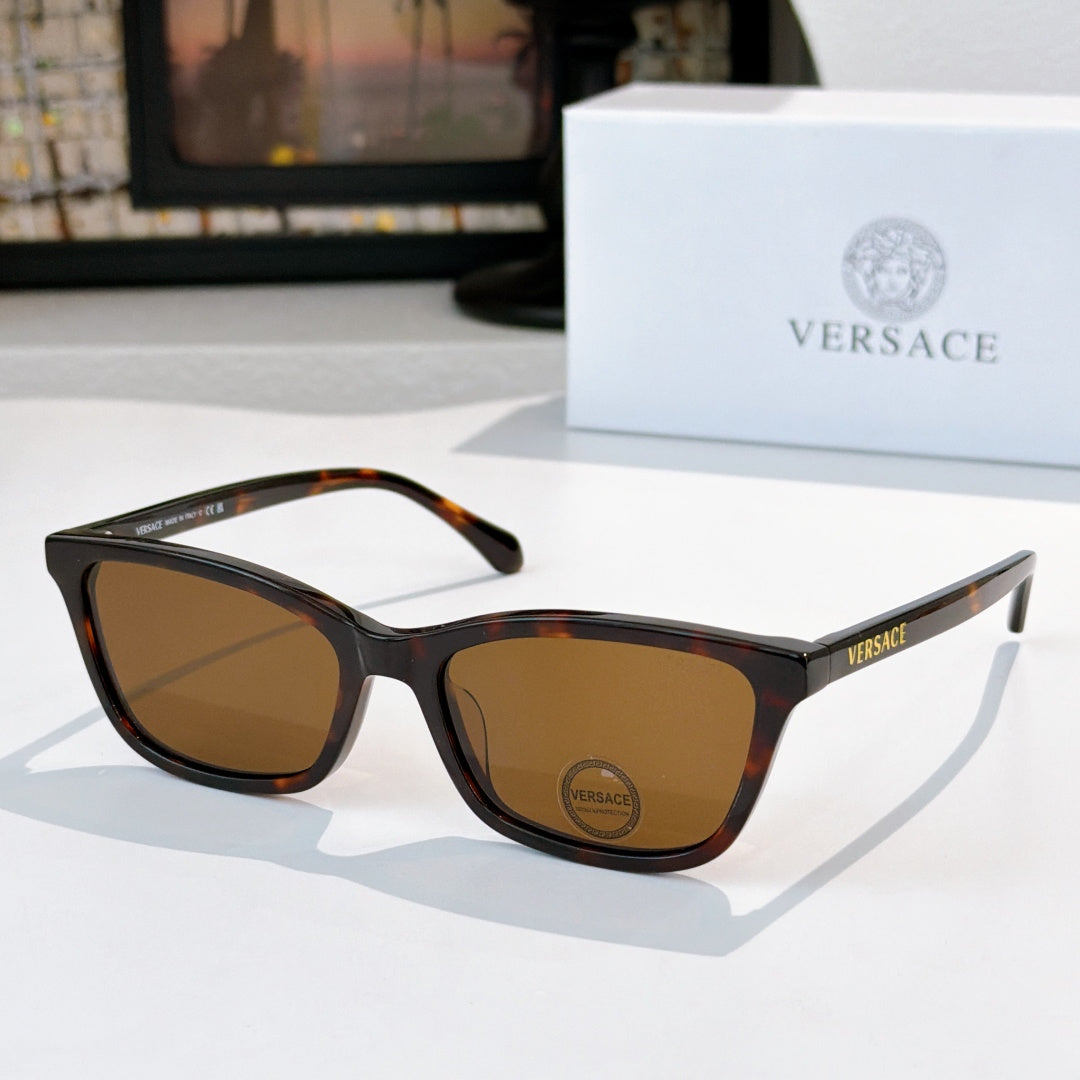 Versace sunglasses with tortoise acetate frames and brown lenses, logo on temple.