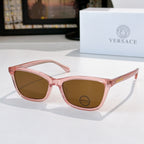 Versace sunglasses with pink acetate frames and brown lenses, small logo on lens.