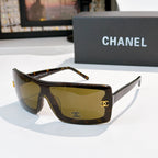 Chanel sunglasses, tortoiseshell frame with amber lens tint and gold CC logo