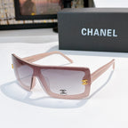 Chanel sunglasses, pale pink frame with light pink lens tint and gold CC logo