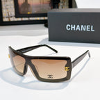 Chanel sunglasses, tortoiseshell frame with tan lens tint and gold CC logo