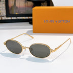 Louis Vuitton sunglasses, gold-tone oval frames with dark brown lenses, front view.