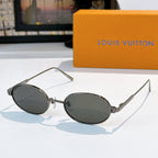 Louis Vuitton sunglasses, silver-tone oval frames with dark lenses, angled front view.