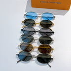 Louis Vuitton sunglasses set, multiple oval frames with blue, brown, and black lenses.