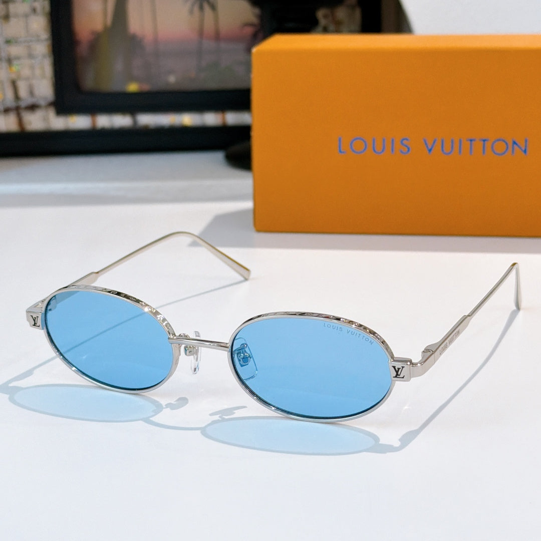 Louis Vuitton sunglasses, silver-tone oval frames with blue lenses, angled front view.