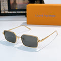 Gold-tone sunglasses with dark lenses and rectangular square frames