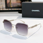 Chanel silver-tone round sunglasses with dark lenses and chain-like temple detail
