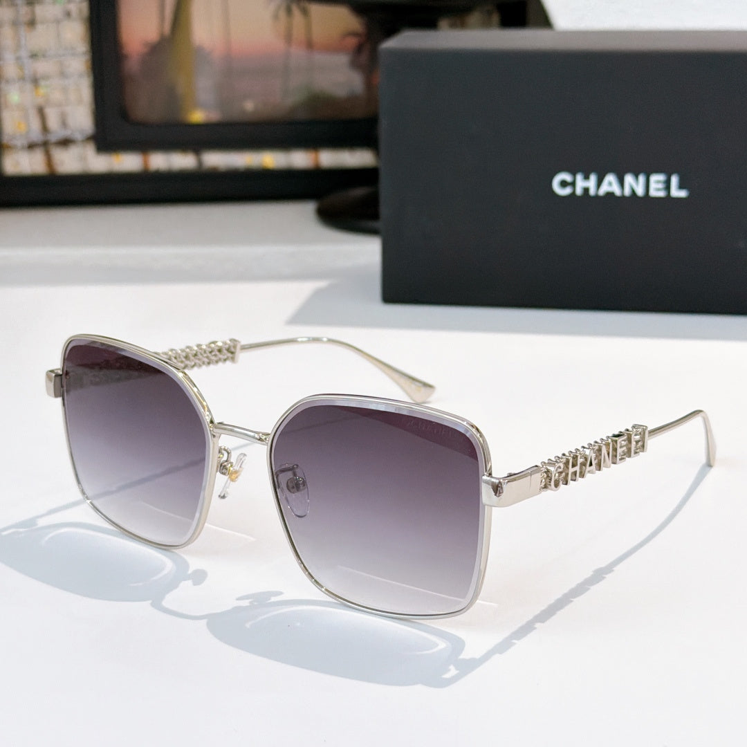 Chanel silver-tone round sunglasses with dark lenses and chain-like temple detail