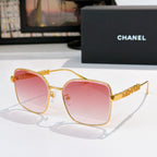 Chanel gold-tone square sunglasses with pink-tinted lenses and logo temple detail