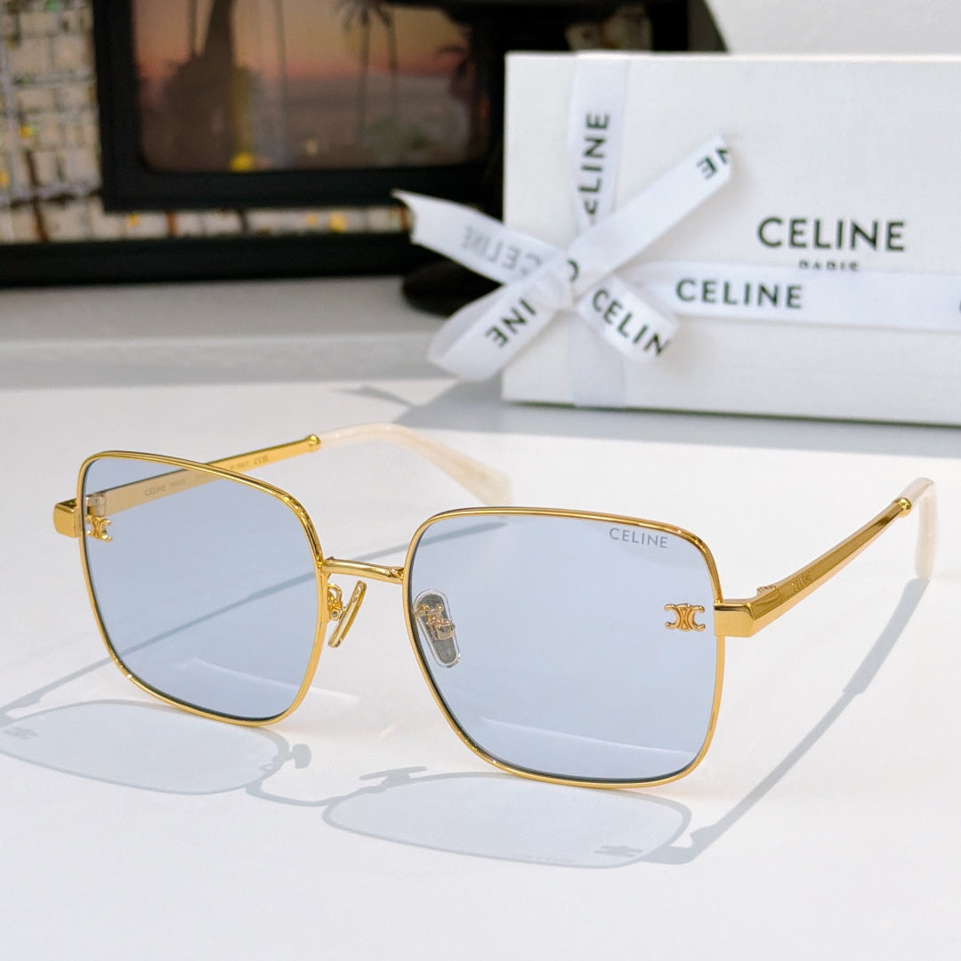 Celine sunglasses, gold frame with pale blue gradient lenses