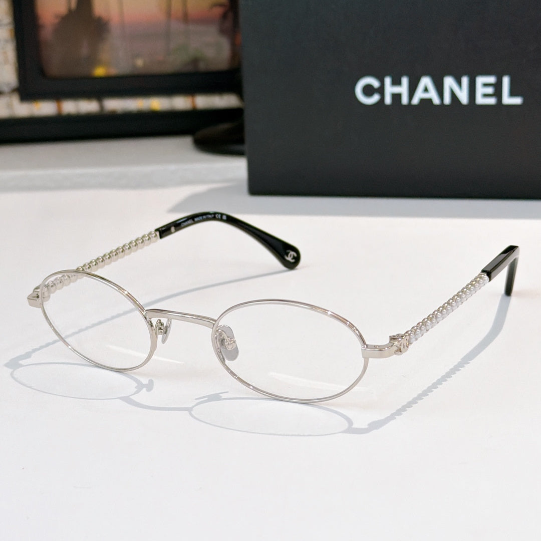 Silver round eyeglasses with clear lenses and beaded chain temples