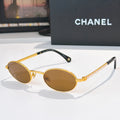 Gold round sunglasses with brown lenses and beaded chain temples