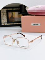 MiuMiu glasses with clear lenses and thin rose-gold frame
