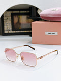 MiuMiu glasses with rose-pink lenses and gold square frame