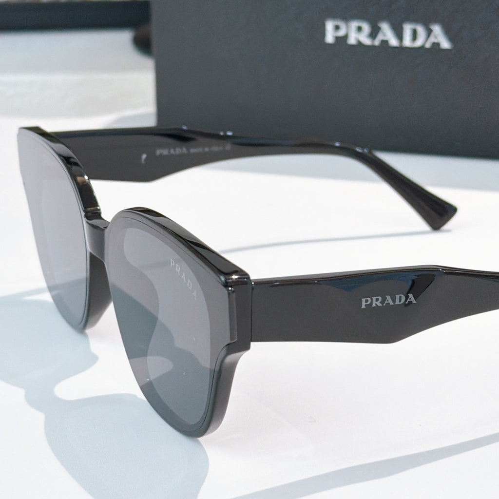 Prada black oversized square sunglasses with dark tinted lenses