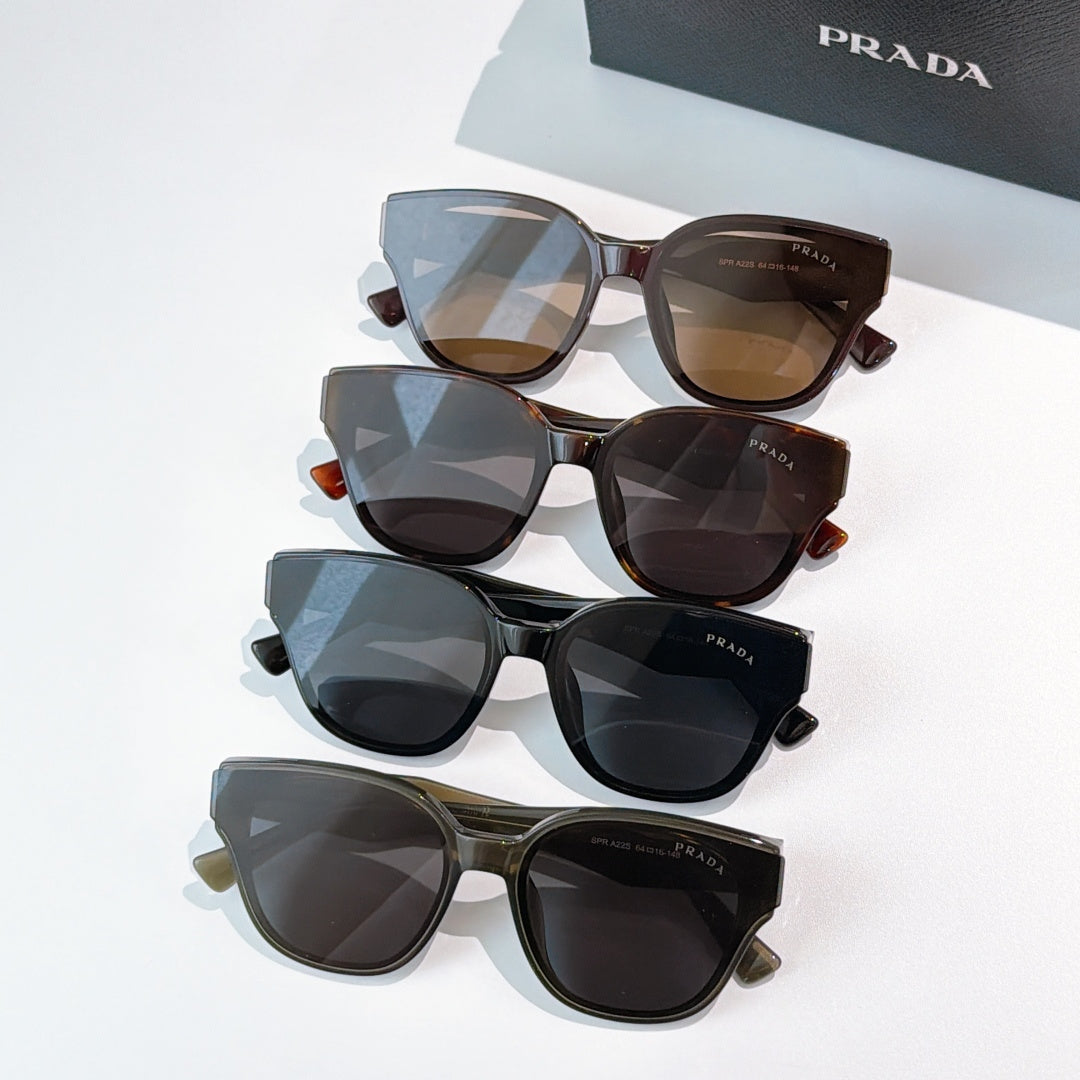 Prada sunglasses set with assorted dark tinted lenses and frames