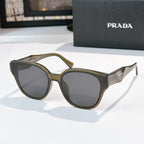 Prada olive and gray cat-eye sunglasses with dark tinted lenses