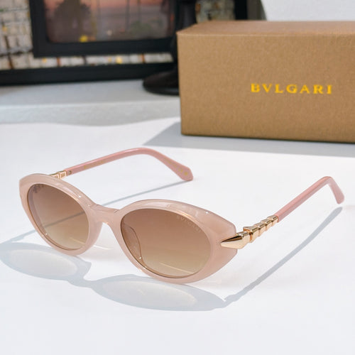 Bvlgari sunglasses with pale pink round lenses and rose-gold metal bridge