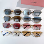 Assorted gold-frame sunglasses with tinted lenses in blue, brown, and pink shades