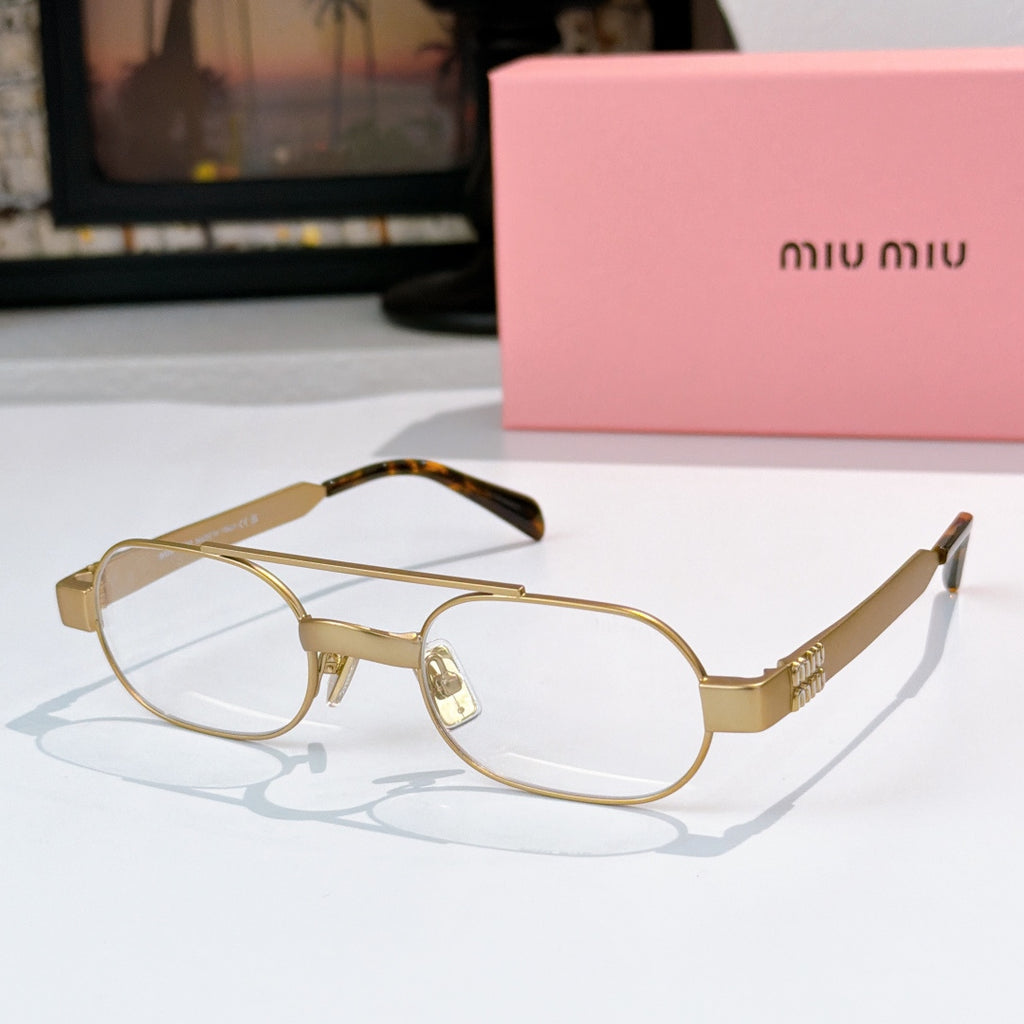 Gold-tone eyeglasses with clear lenses and tortoiseshell temples