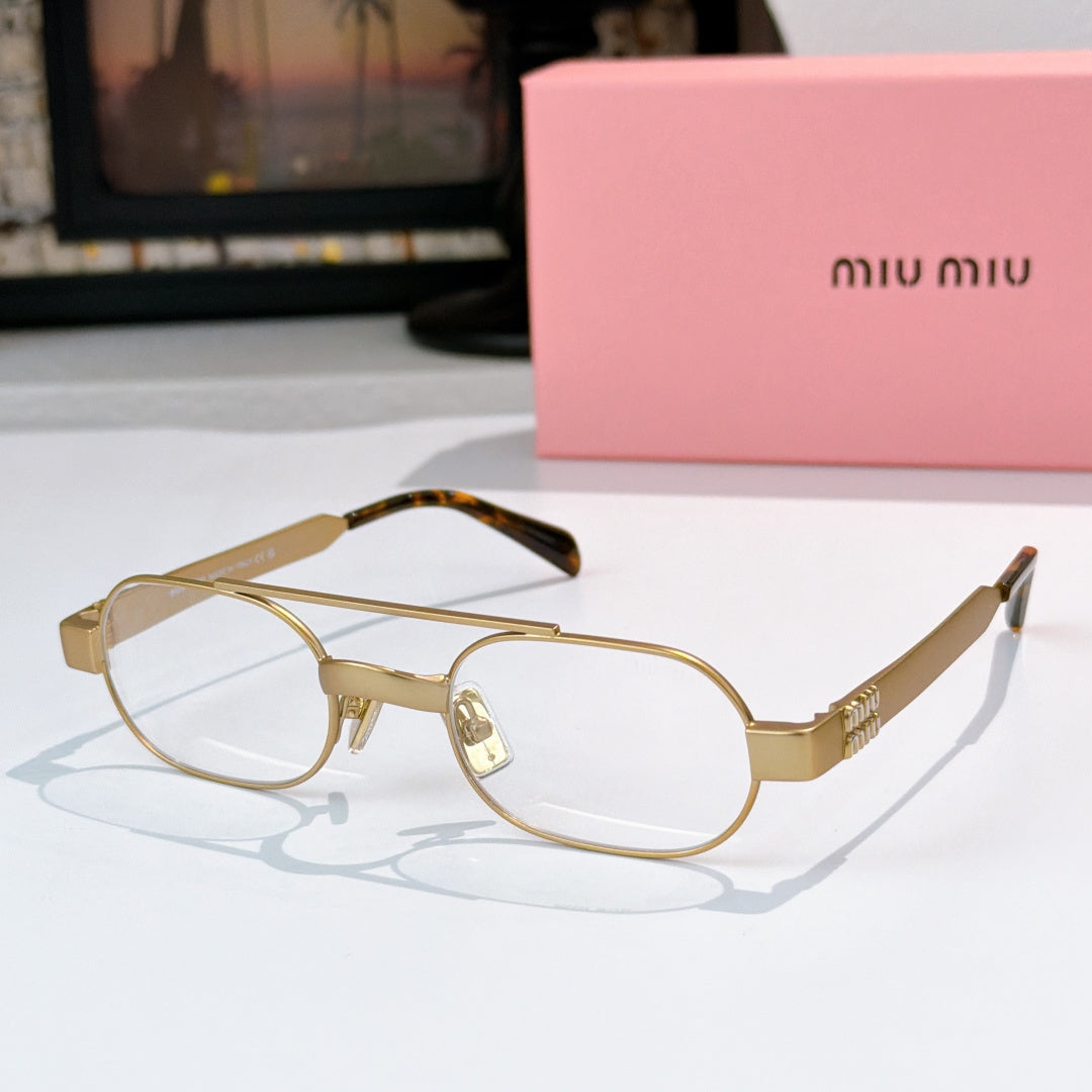 Gold-tone eyeglasses with clear lenses and tortoiseshell temples