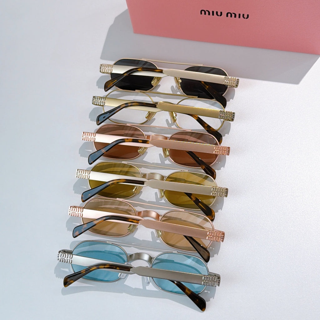 Set of gold-tone sunglasses with colored lenses and tortoiseshell temples
