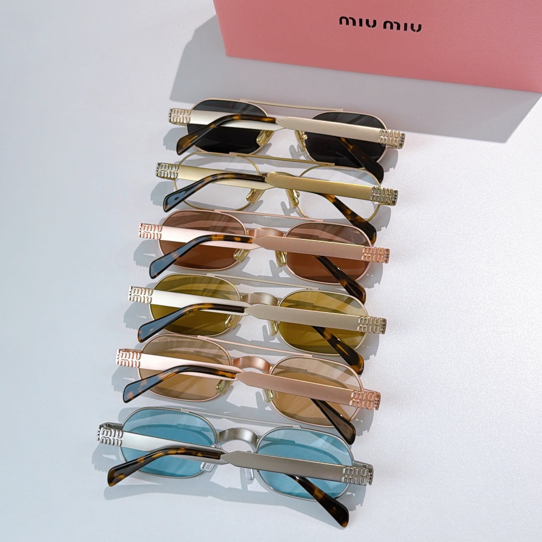 Set of gold-tone sunglasses with colored lenses and tortoiseshell temples