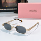 Gold-tone sunglasses with dark blue lenses and tortoiseshell temples