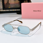 Gold-tone sunglasses with light blue lenses and tortoiseshell temples