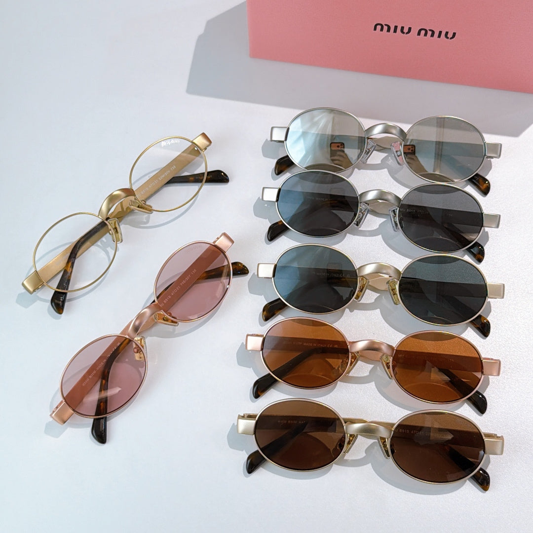 MiuMiu sunglasses assortment with multiple gold-tone frames and tinted lenses, laid out