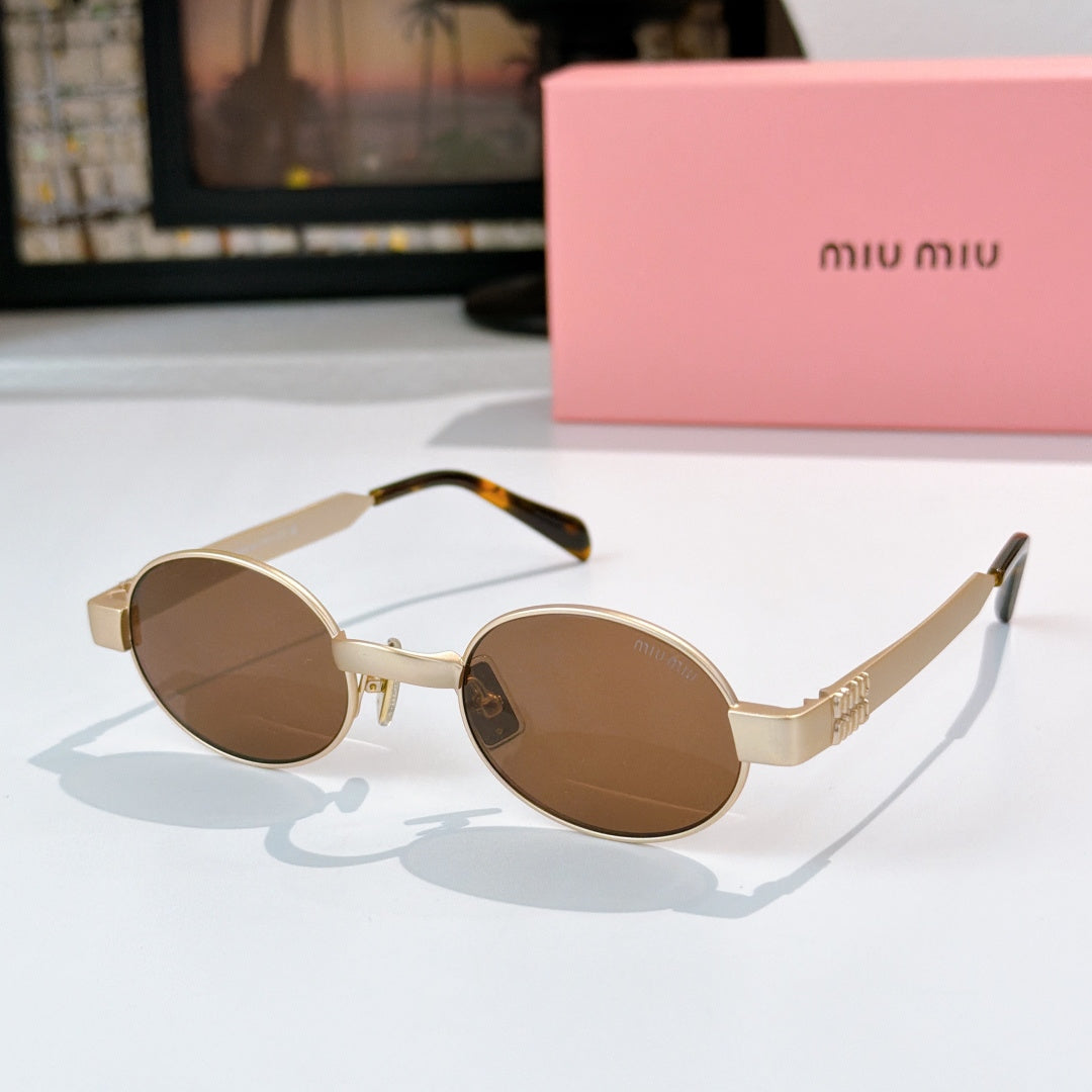 MiuMiu sunglasses with gold-tone round frames, brown lenses, tortoise-pattern temples