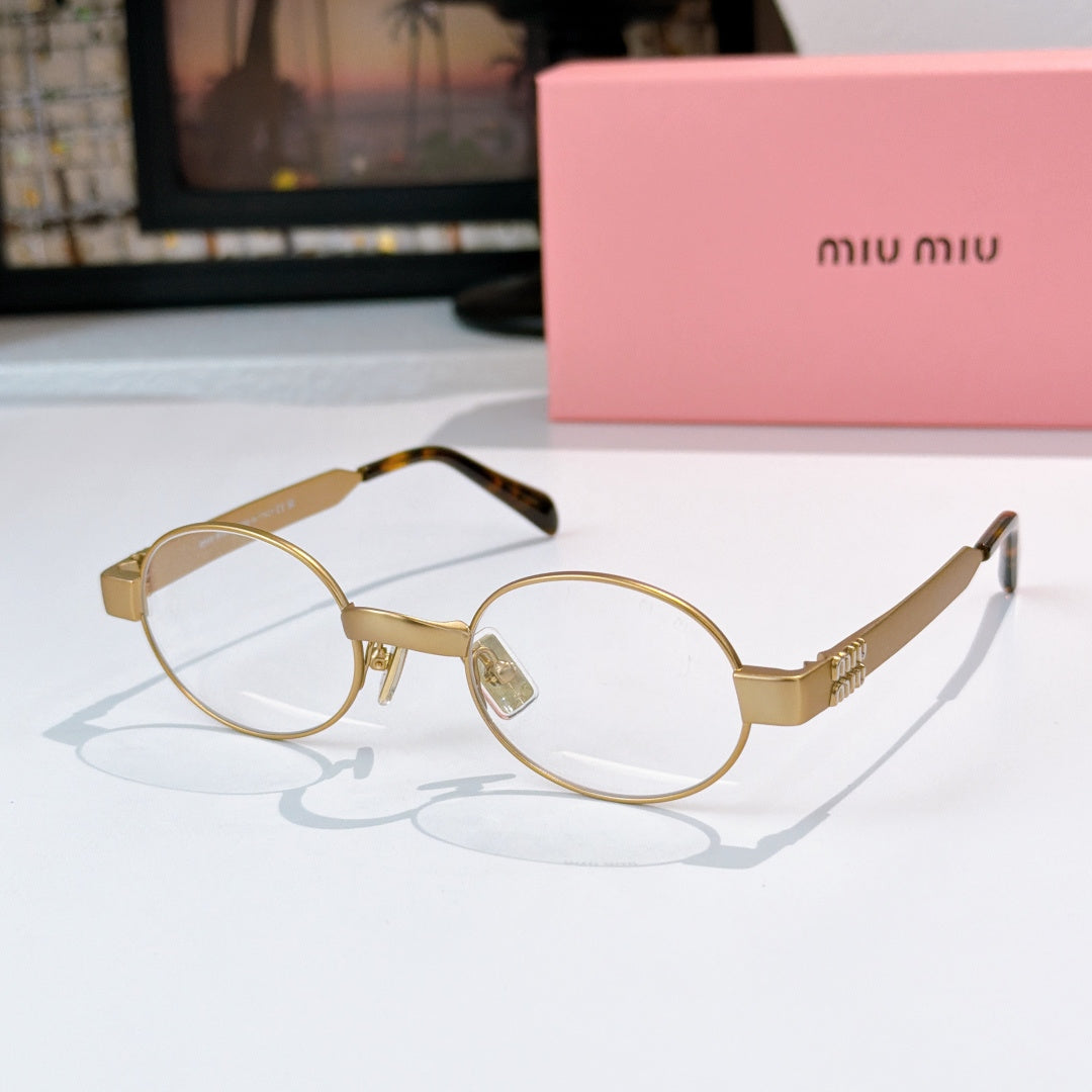 MiuMiu sunglasses with gold-tone round frames, clear lenses, tortoise-pattern temples
