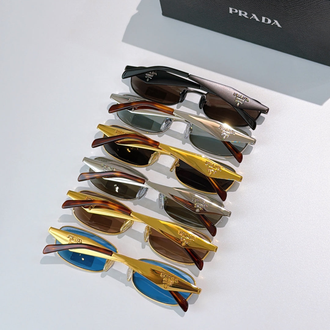 Prada sunglasses assortment, multiple frames in mixed colors on display