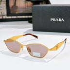 Prada glasses with gold frames, pink lenses, yellow-brown arms