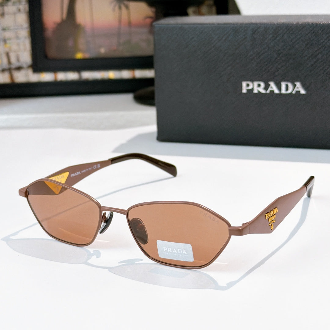 Prada glasses with rose-brown frames, brown lenses, gold logo temples