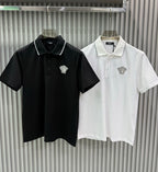Two Versace polo shirts: black and white, each with white-trim collar and Medusa crest