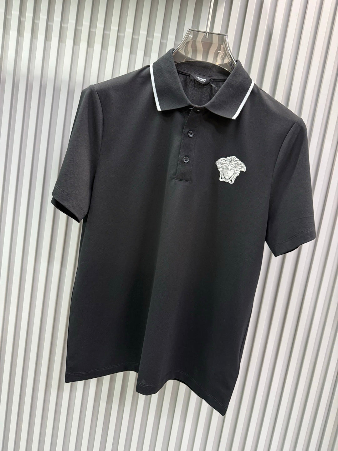 Black Versace polo shirt, button placket and white contrast collar with Medusa crest