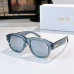 Dior sunglasses with blue frames and light blue-tinted lenses.