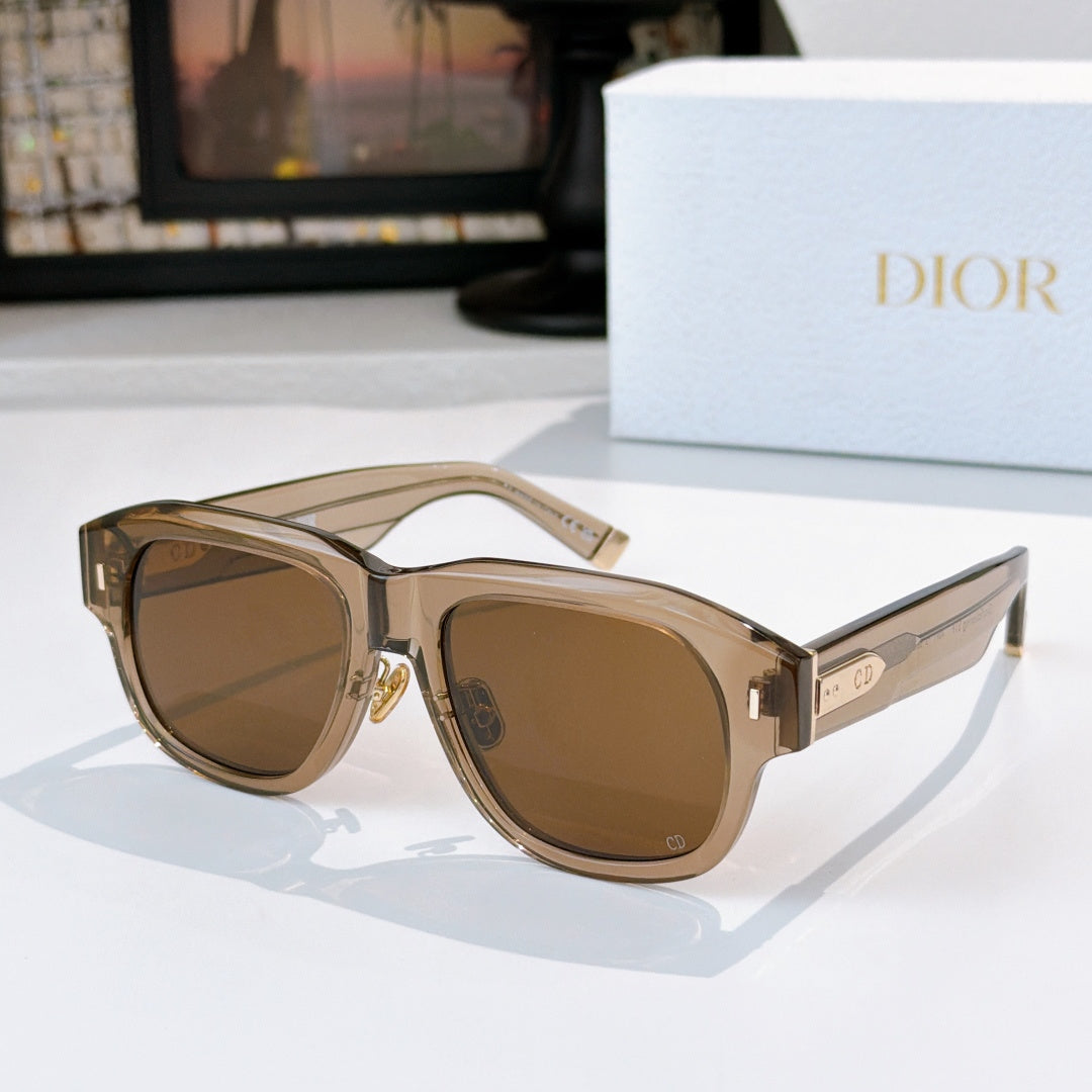 Dior sunglasses with brown frames and warm brown lenses.