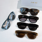 Dior sunglasses assortment with blue, black, and brown frames and tinted lenses.