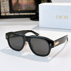 Dior sunglasses with black frames and dark gray tinted lenses.