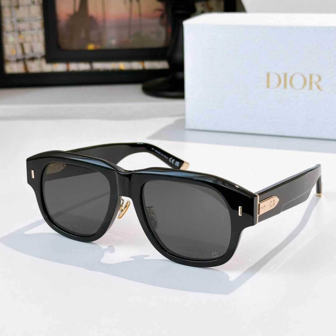 Dior sunglasses with black frames and dark gray tinted lenses.