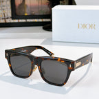 Dior sunglasses, dark tortoiseshell frame with dark tinted lenses