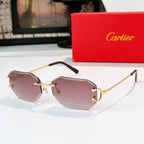 Gold metal octagonal sunglasses with pink-tinted lenses and dark tortoise temples