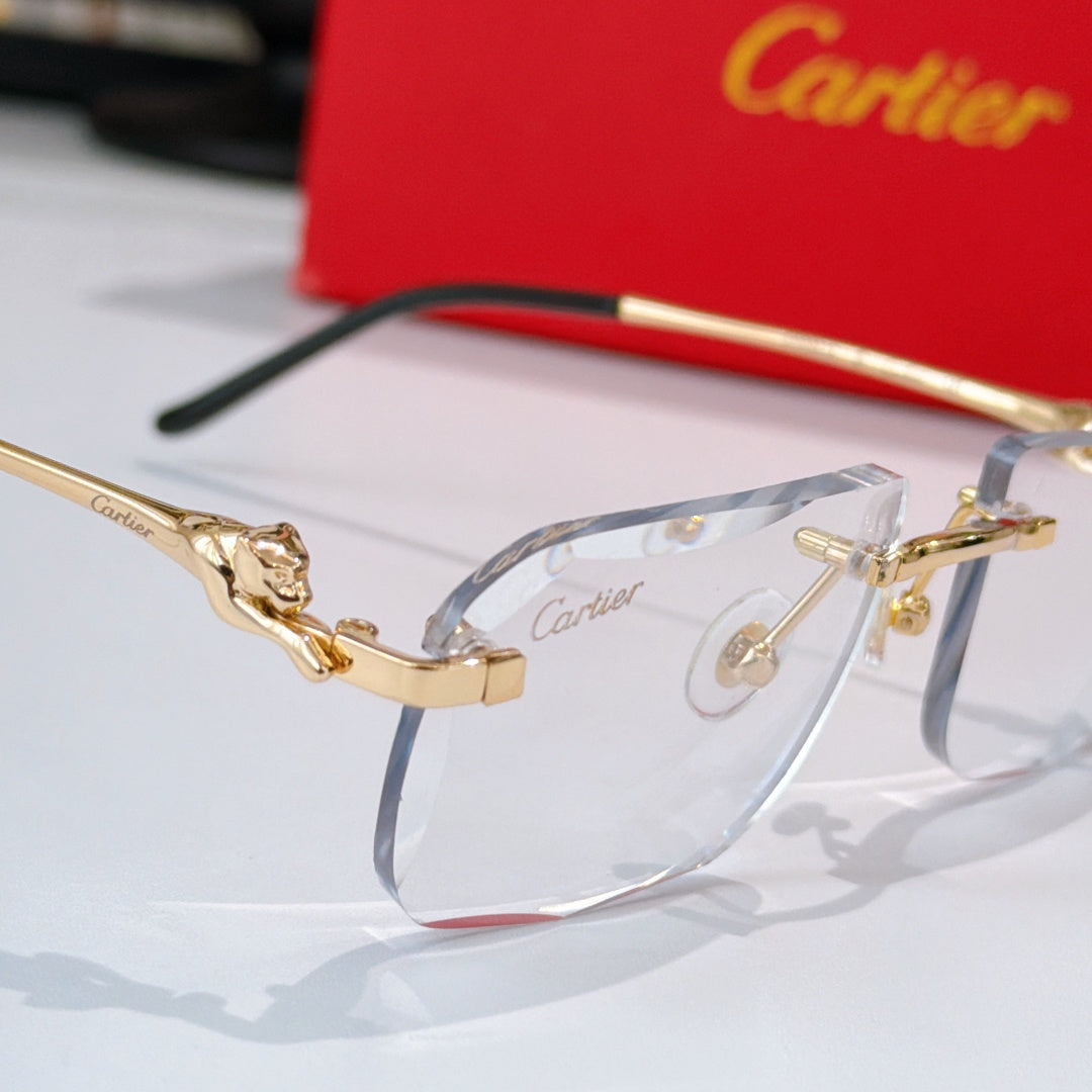 Cartier glasses close-up with clear lenses, gold frame accents and black temple arms