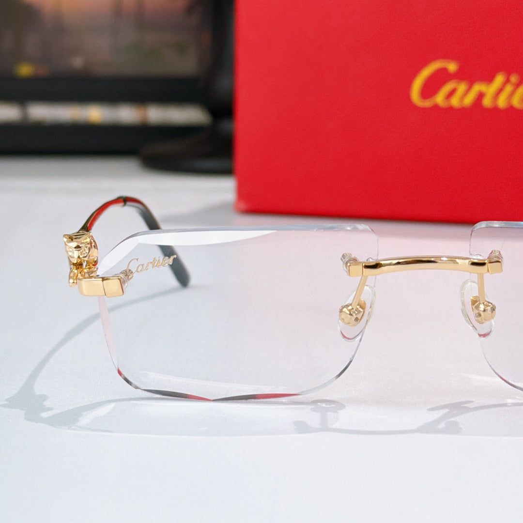 Cartier glasses with gold frame detail and clear lenses, black temple arms