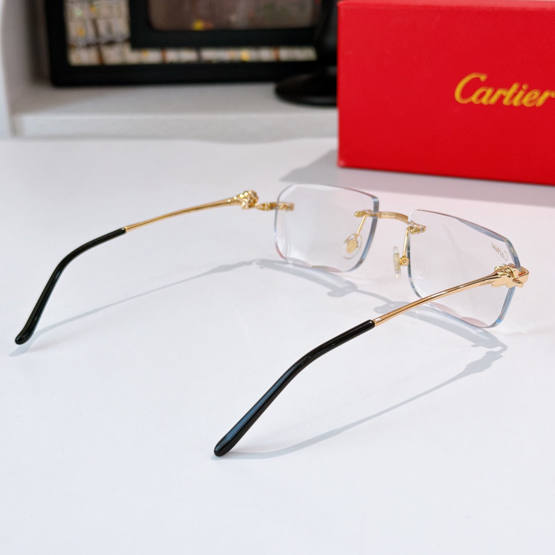 Cartier glasses with clear lenses, gold bridge accents and black temple arms